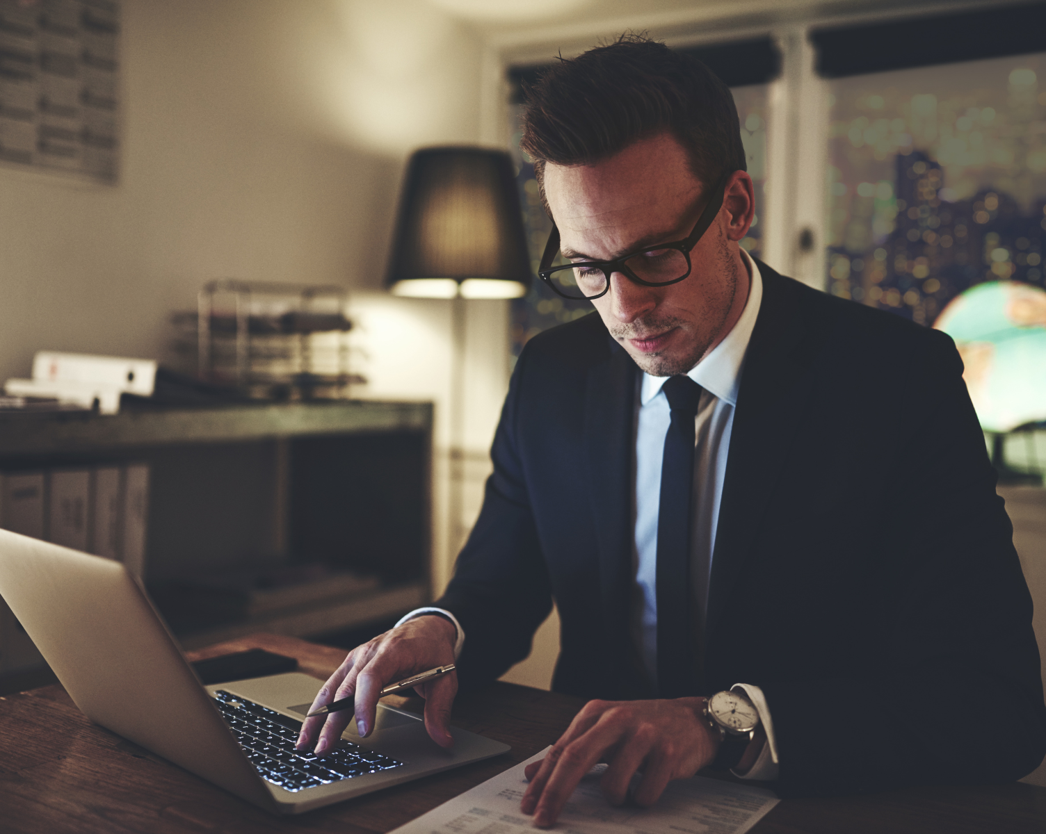 Homepage- Hotel-Manager-Working-At-Desk